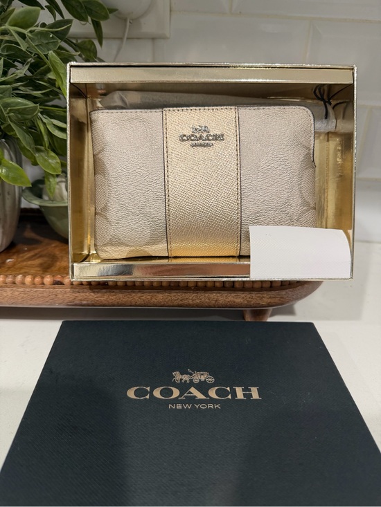 Coach Accessories - Coach Metallic Rose Gold Leather Zip Wristlet